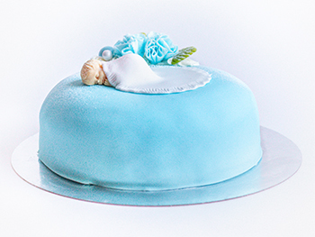 Christening cake with baby decoration, blue